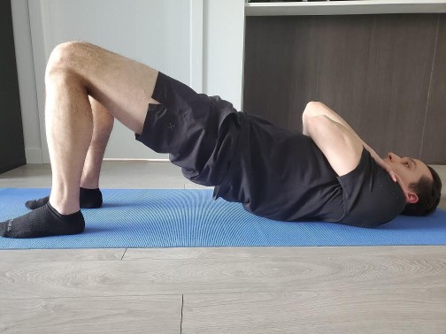 half-bridge position for lumber physiotherapy